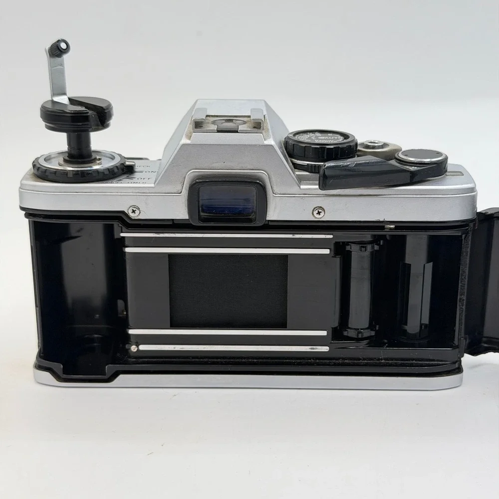 Olympus OM10 35mm Film SLR Camera Body Silver Black with Manual Adapter TESTED